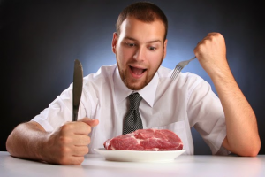 young-man-eating-raw-meat